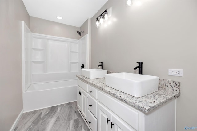 2501 Andrew Jackson Way NE, Huntsville, AL 35811 - full bathroom featuring shower / bathtub combination, a sink, and double vanity