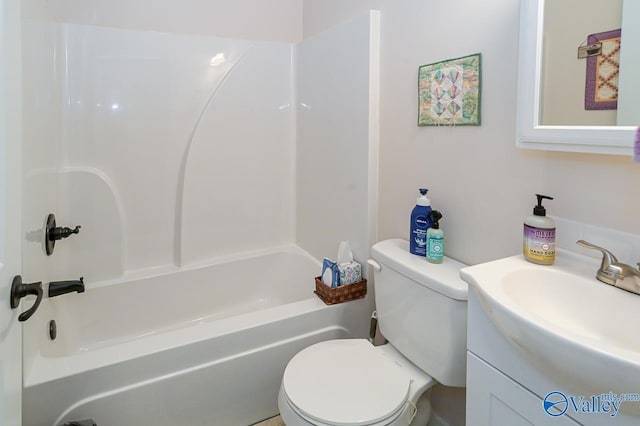 full bathroom with shower / bath combination, vanity, and toilet