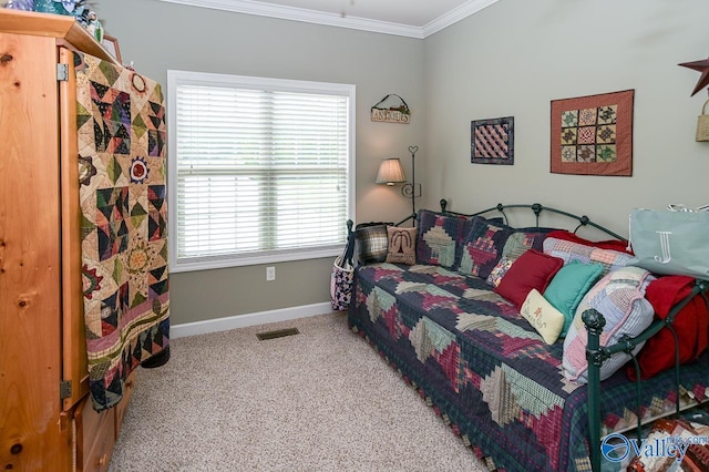 bedroom with ornamental molding and light colored carpet