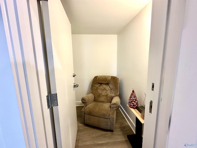 living area featuring light hardwood / wood-style floors