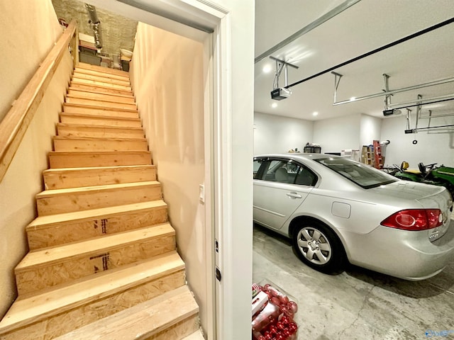 staircase with concrete flooring