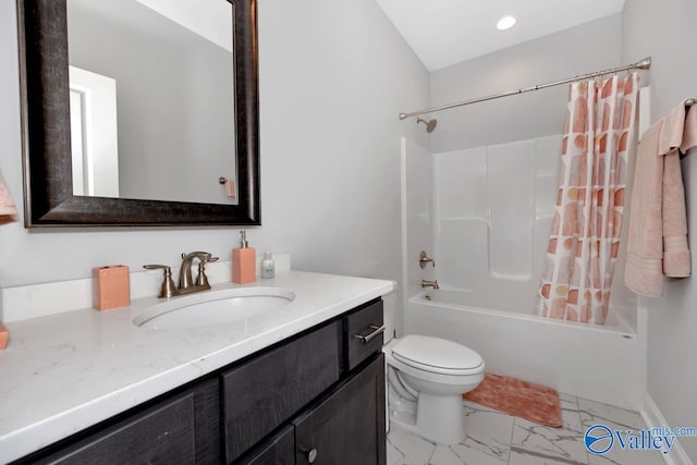 full bathroom featuring vanity, shower / bath combo, and toilet