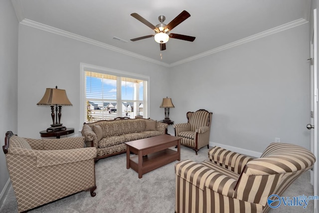 living room with crown molding, ceiling fan, and light colored carpet