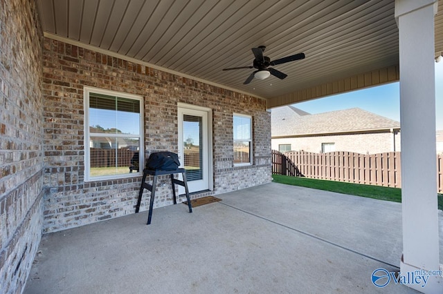 view of patio featuring ceiling fan