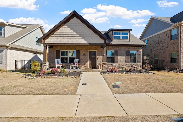 craftsman-style house featuring covered porch