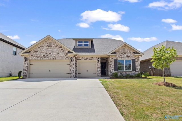 craftsman house featuring a garage and a front yard