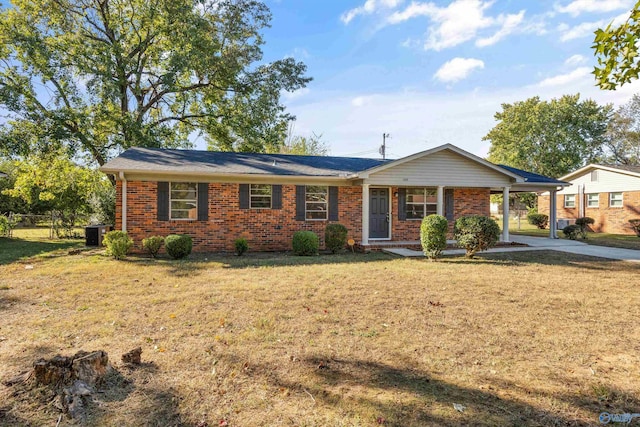 ranch-style house with a front lawn and central AC unit