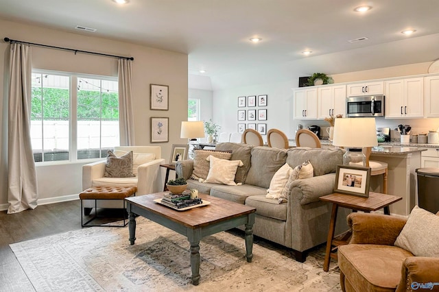 living room featuring light wood-type flooring