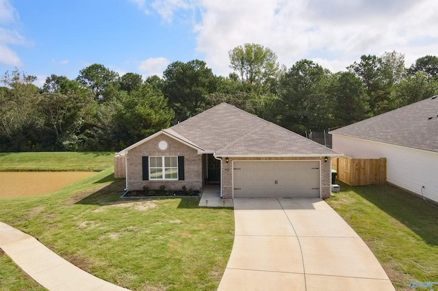 single story home with a front yard and a garage