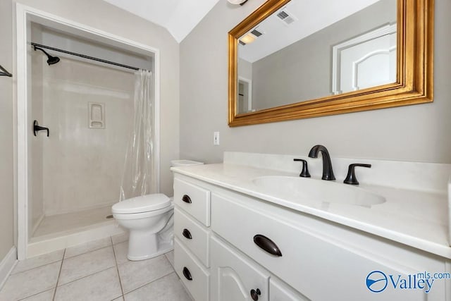 bathroom with tile patterned flooring, vanity, toilet, curtained shower, and visible vents