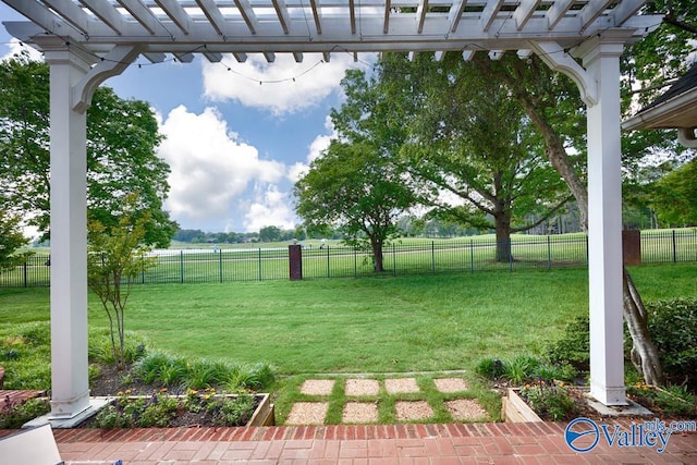 view of yard featuring a fenced backyard and a pergola
