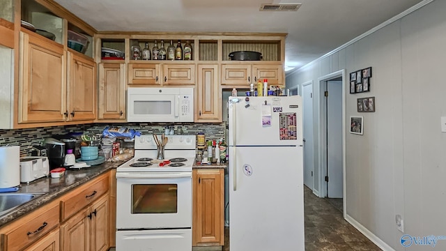 kitchen featuring visible vents, white appliances, dark countertops, and decorative backsplash