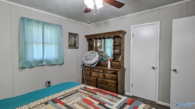 bedroom featuring ornamental molding and a ceiling fan