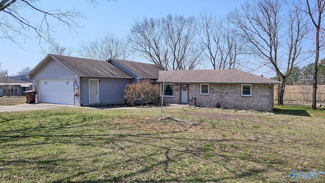 ranch-style home with driveway, brick siding, and a front yard