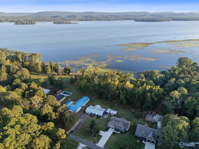 bird's eye view with a water and mountain view