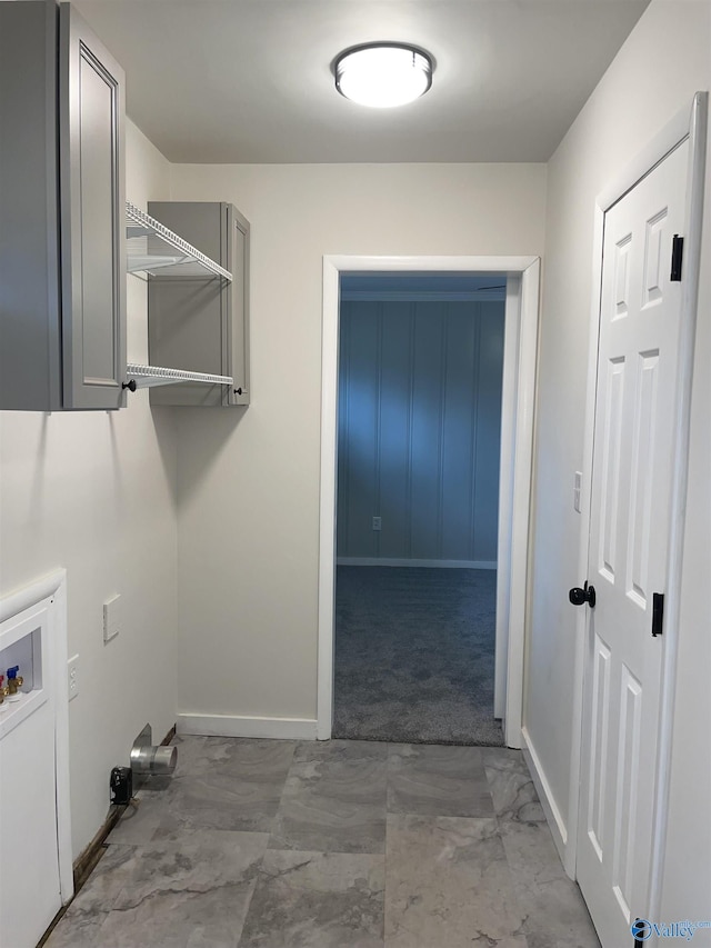 washroom featuring washer hookup and carpet flooring