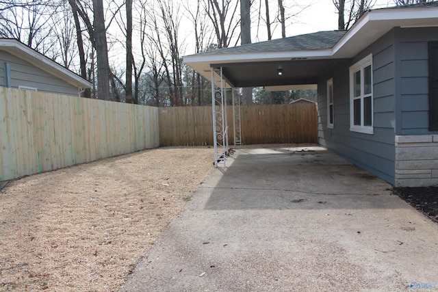 view of yard with a carport