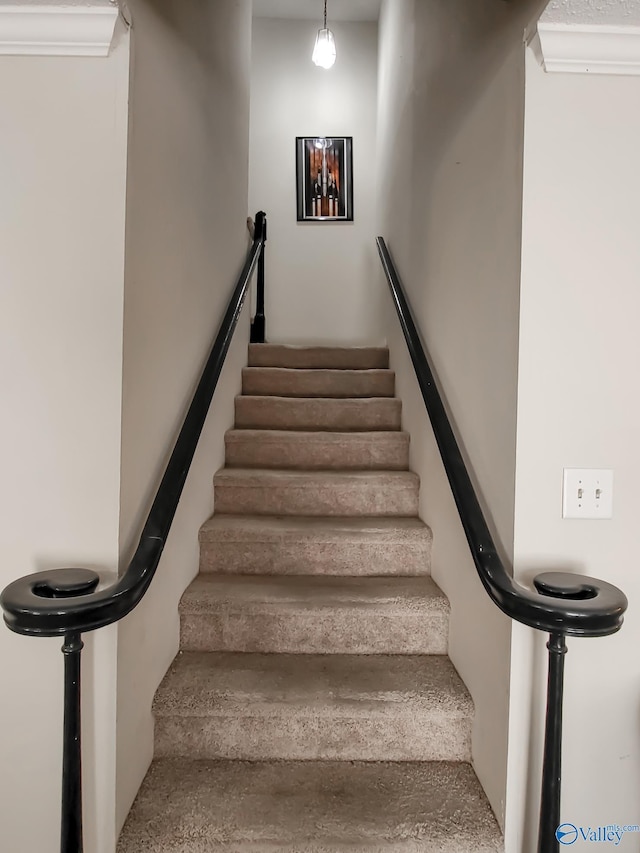 stairs with crown molding