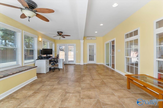 sunroom / solarium featuring french doors and a wall mounted air conditioner