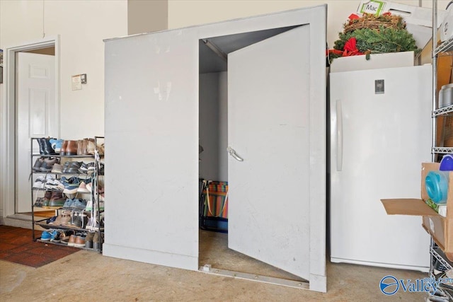 interior space with white fridge