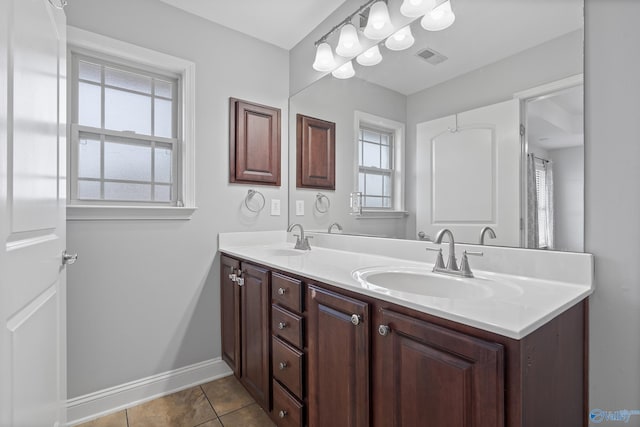 bathroom featuring vanity and tile patterned flooring