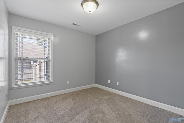 view of carpeted spare room