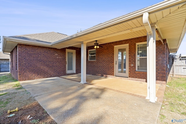 exterior space featuring ceiling fan and a patio area