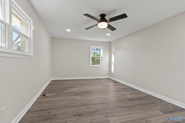 unfurnished room featuring a ceiling fan, recessed lighting, baseboards, and wood finished floors