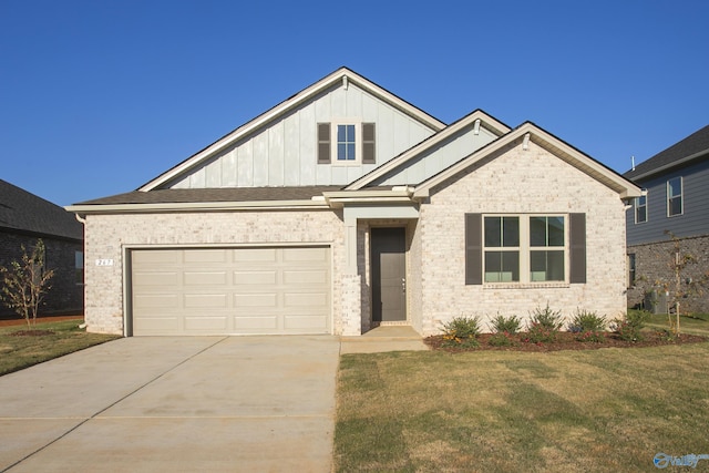 view of front of house with a garage and a front yard