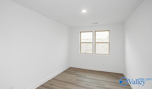 empty room with light wood-type flooring