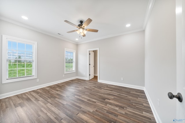 empty room featuring ceiling fan, baseboards, and dark wood-style floors