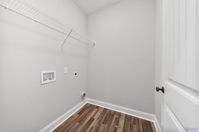 laundry room featuring laundry area, dark wood-type flooring, hookup for an electric dryer, washer hookup, and baseboards