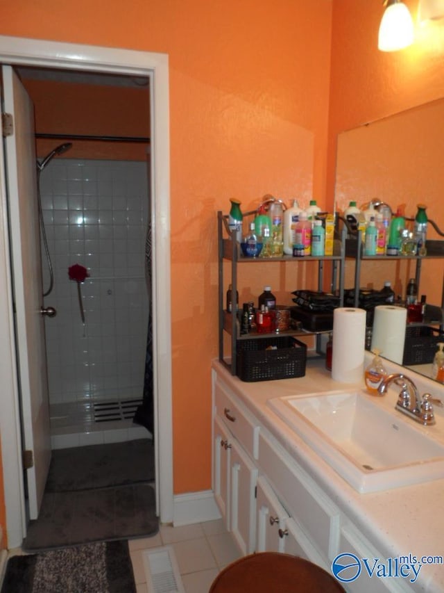 bathroom with curtained shower and vanity