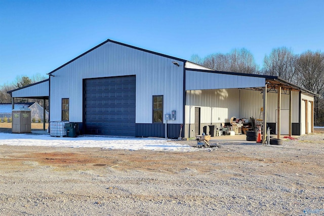 view of outbuilding featuring a garage