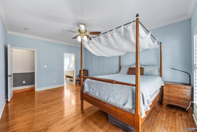 bedroom featuring wood-type flooring, ceiling fan, and crown molding