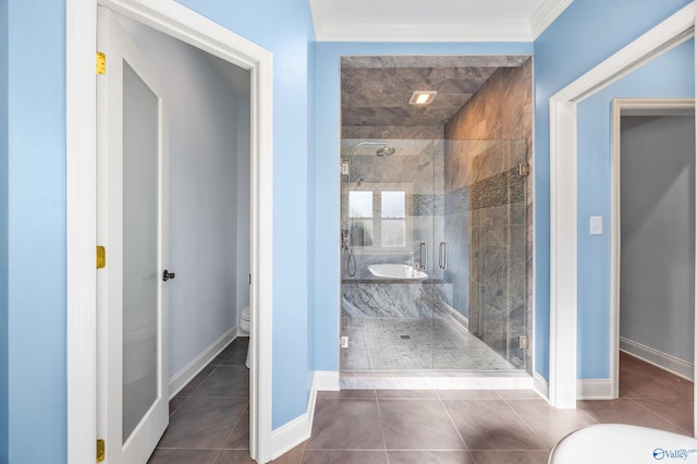 bathroom with toilet, crown molding, tile patterned flooring, and shower with separate bathtub