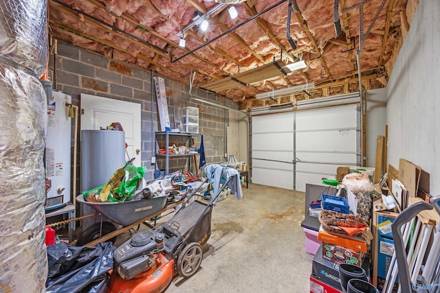 garage with a garage door opener and gas water heater