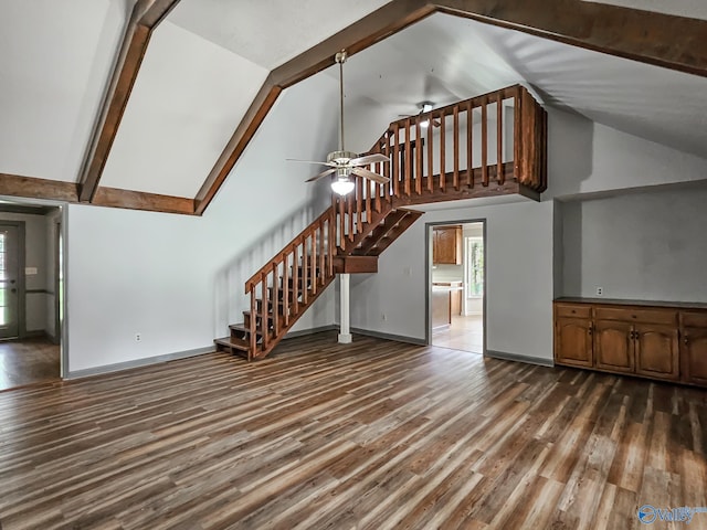 unfurnished living room with high vaulted ceiling, ceiling fan, beamed ceiling, and dark hardwood / wood-style floors