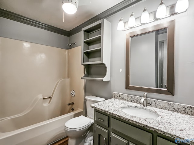 full bathroom with ornamental molding, shower / tub combination, vanity, and toilet