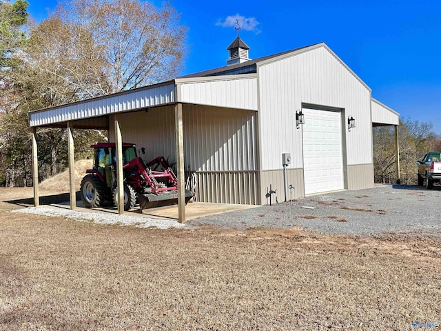 view of outbuilding featuring a garage