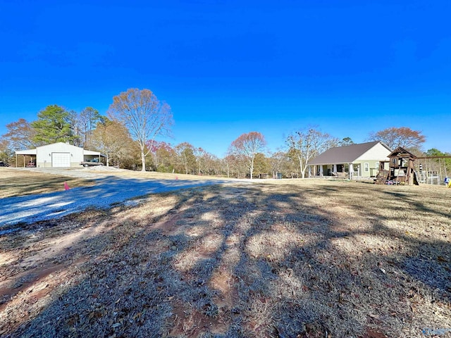 view of yard with a garage