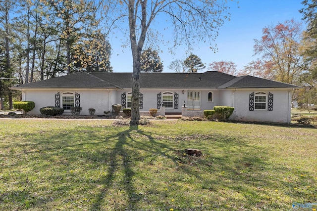 3000 Eolyne Kelly Way NE, Huntsville, AL 35811 - back of house featuring brick siding and a lawn