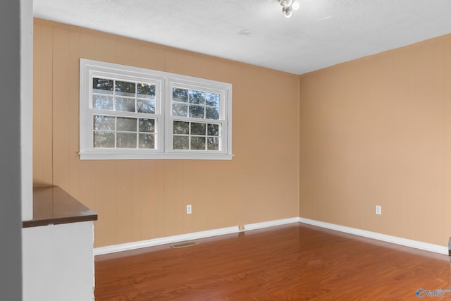 3000 Eolyne Kelly Way NE, Huntsville, AL 35811 - unfurnished room with visible vents, baseboards, and wood finished floors