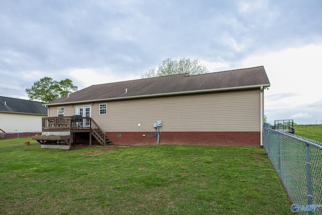 back of house with a deck, a fenced backyard, crawl space, french doors, and a lawn