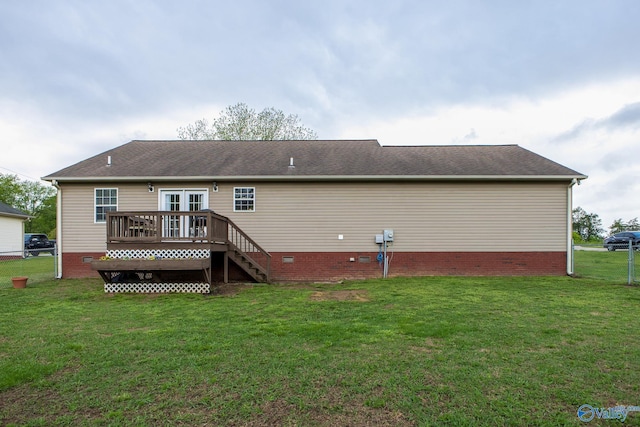 back of property featuring crawl space, a deck, a yard, and stairway