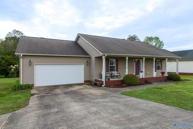 view of front of home with a front lawn, a shingled roof, covered porch, concrete driveway, and an attached garage