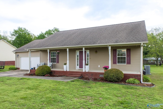 single story home with cooling unit, aphalt driveway, covered porch, a front yard, and a garage