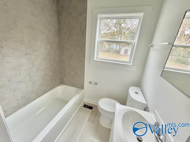 full bathroom featuring vanity, toilet, and tub / shower combination