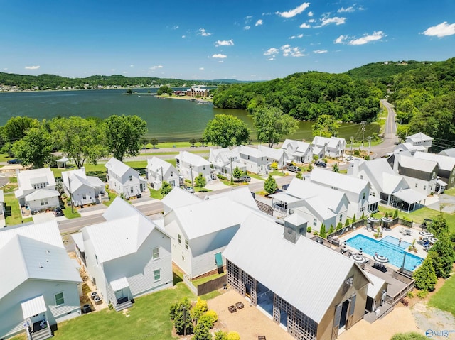 birds eye view of property featuring a water view and a residential view