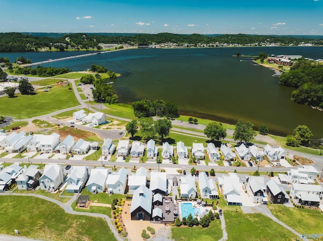 birds eye view of property featuring a residential view and a water view